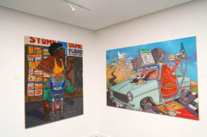 Two colourful paintings in a gallery. Left: A person on a motorbike with vibrant Nigerian street-esque signs. Right: A surreal scene of a blue car stuffed with objects.